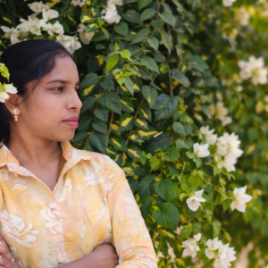 thoughtful pose in a blossoming garden